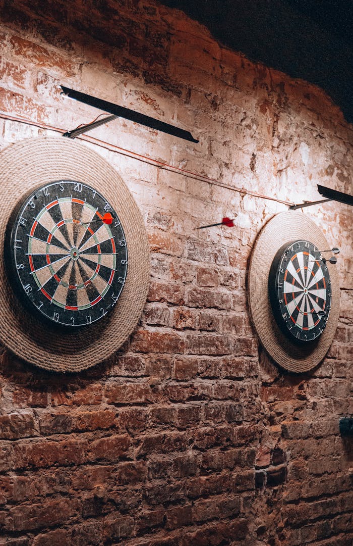 our-experience Two dartboards on a vintage brick wall create a retro vibe inside a Belarus café.