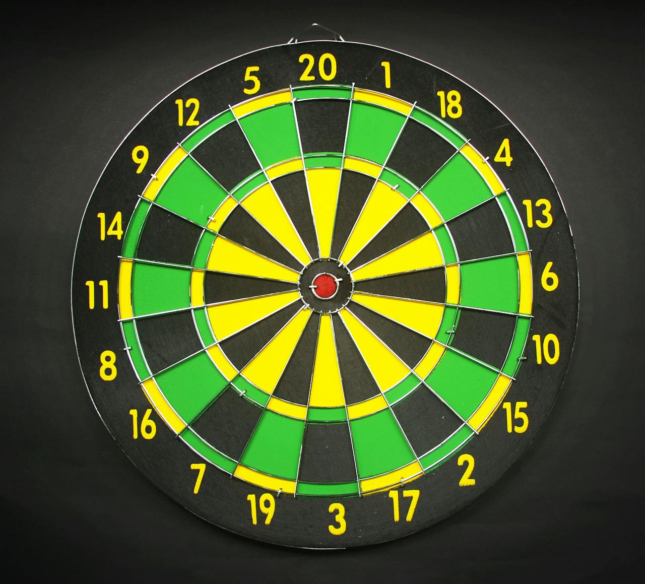 Vibrant dartboard highlighting strategy and skill. Ideal for game enthusiasts.